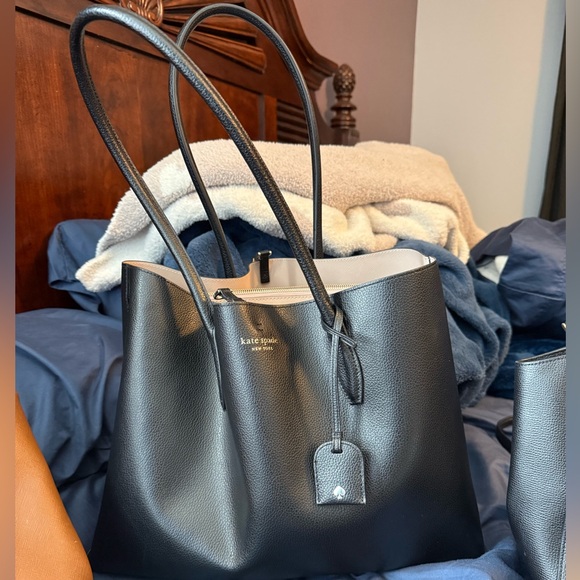 kate spade Handbags - Kate Spade Black Leather Tote with Tag Charm